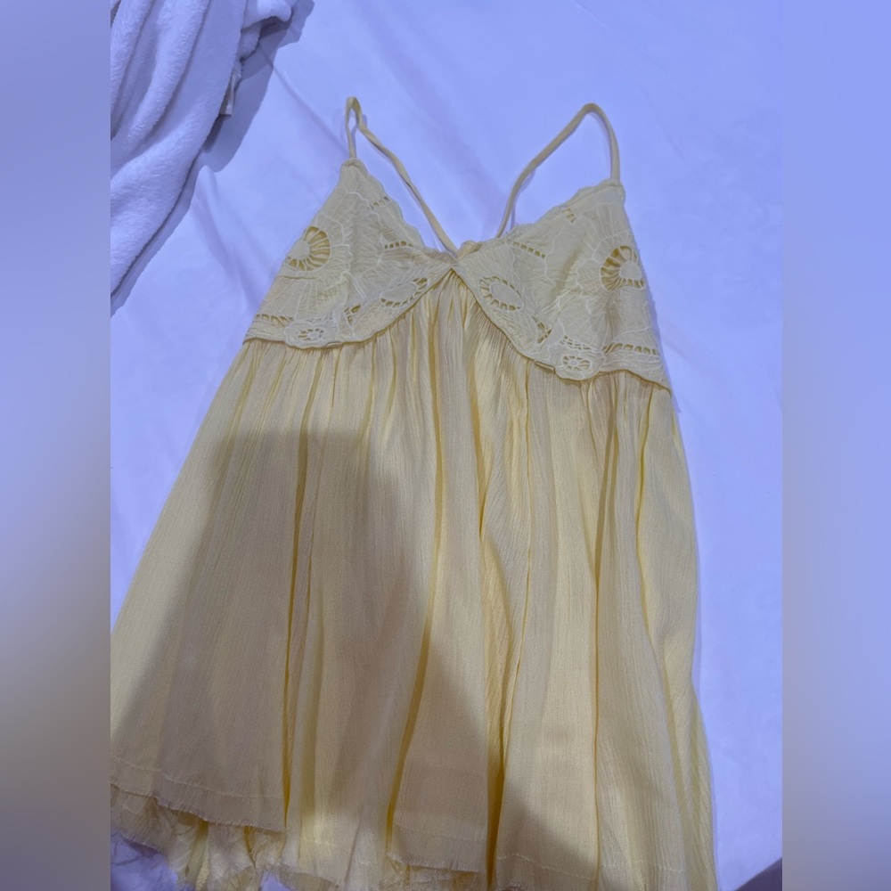 Yellow babydoll top never worn size M